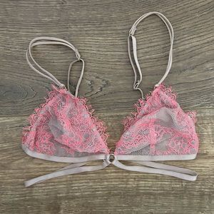 Lace bralett with neon pink stitching